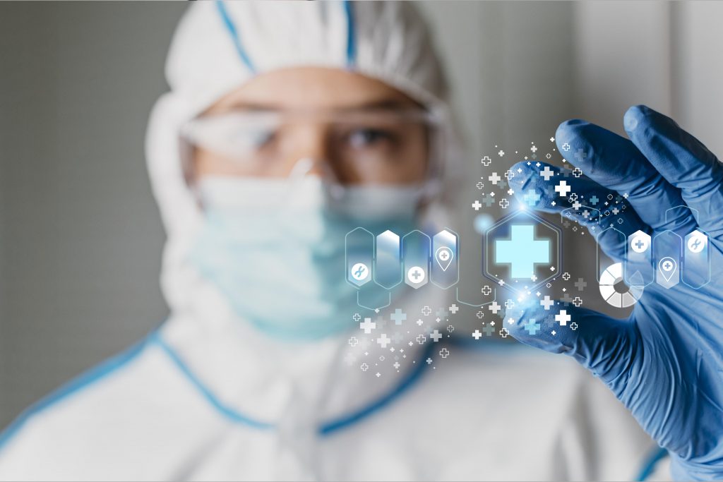 A doctor wearing equipment with a medical banner